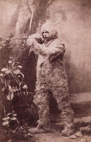 Young man in bear costume