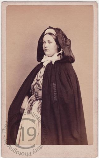 Belgian woman wearing cloak