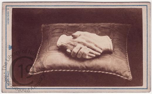 Clasped hands of Browning and his wife