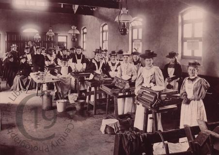 Women making butter at a dairy institute