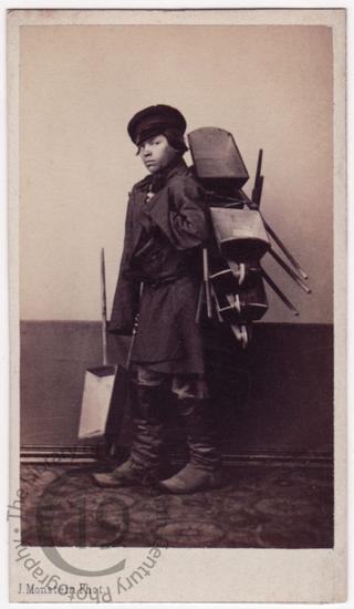 'Boy selling wheelbarrows' 