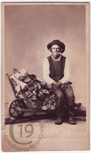 'Finnish sailor with barrow of firewood'