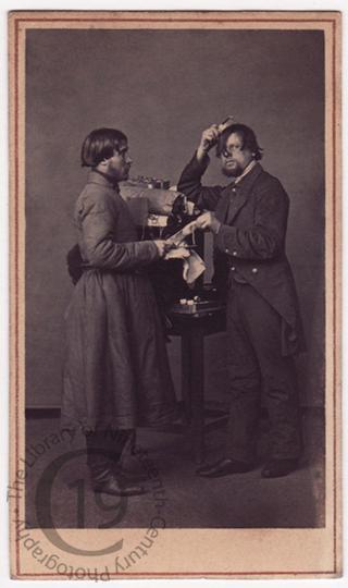 'Pedlar and manservant trying comb'