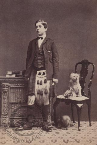 Young man in kilt