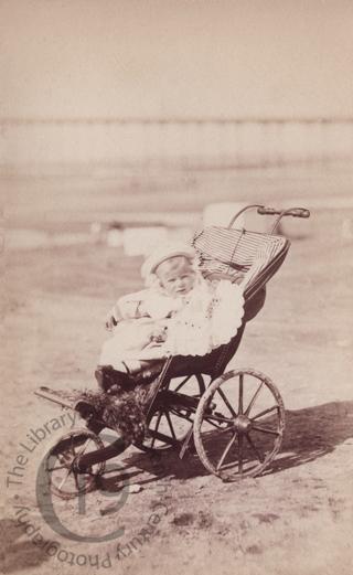 A pushchair on the beach