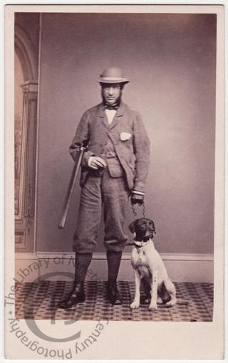 Man with dog and gun