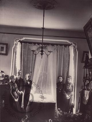 Mourners viewing a corpse